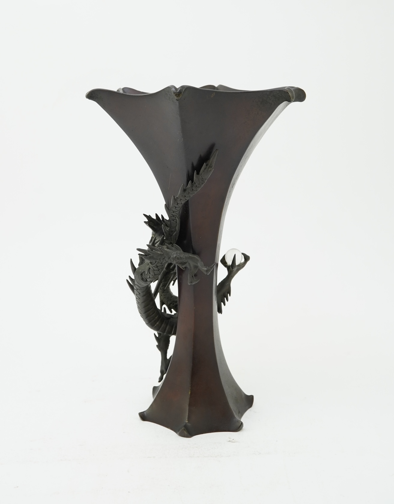 A Japanese bronze 'dragon' hexagonal beaker vase, Meiji period